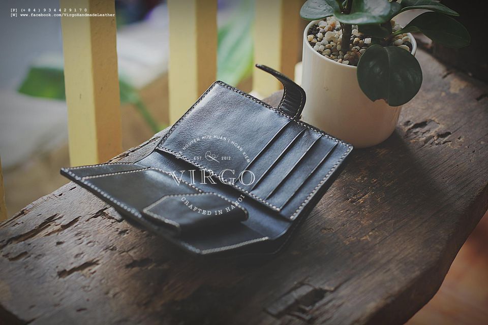 Ship and Sea Men Carving Wallet